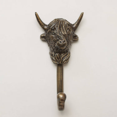 Ylämaan nauta -naulakkokoukku rautaa | Antiikkimessinki | 7,1 x 3,6 x 14,5 cm | Highland Cow-Brass bee-Sasu’s sisustus- ja huonekaluliike